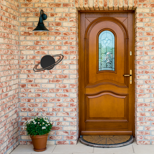 Celestial_Orbit_Metal_Sign__Modern_Pl_Black_Brick_Entrance_Mockup.png